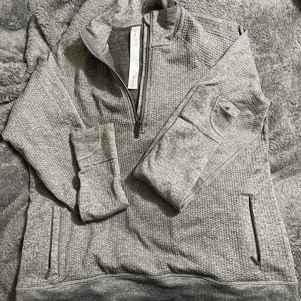 Size 12 Lululemon engineered warmth top (1/2 Zip)